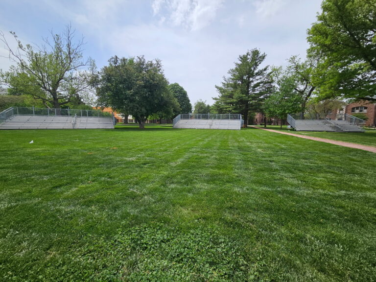 Two 10-Row, 45' Towable Bleachers and one 10-Row 30′Towable Bleacher for an Outdoor Commencement at Grinnell College in Grinnell, Iowa