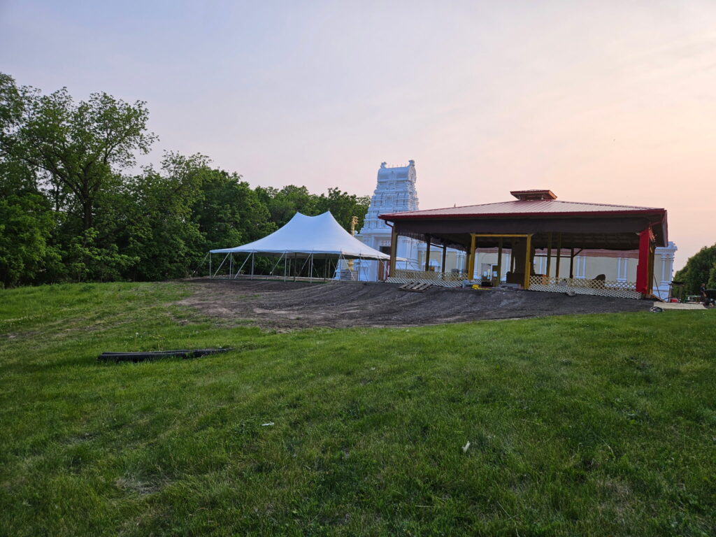 30' x 40' rope and pole tent with Quad City Hindu Temple in the background at Rock Island, Illinois