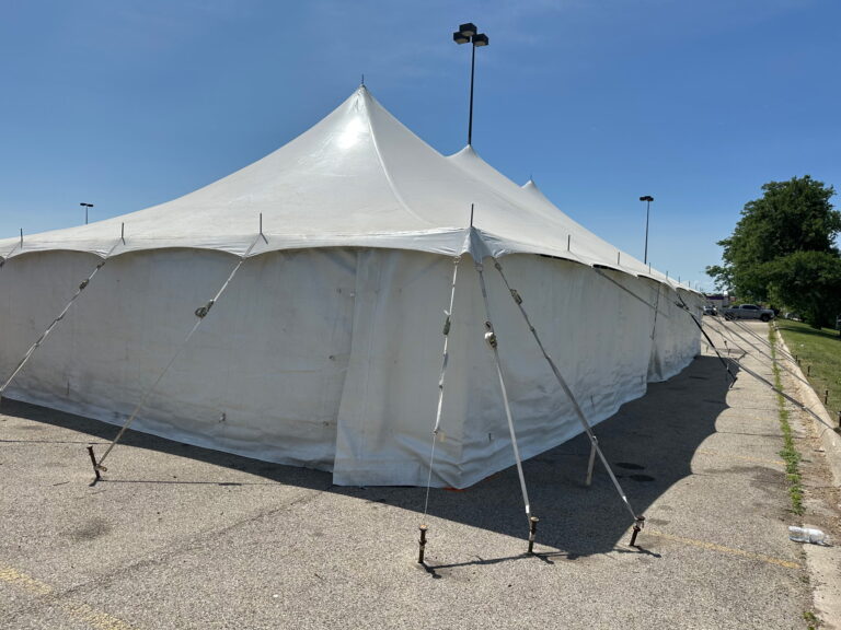 30' x 60' Rope & Pole Tent for Cornellier Fireworks, Rockford, Illinois. Set up in a parking lot.