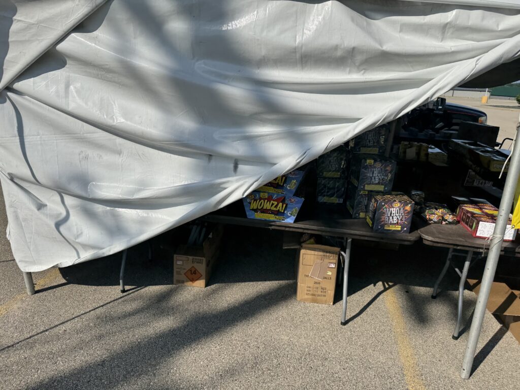 Fireworks Tent (20' x 40' Rope and Pole Tent) in Dubuque, Iowa (fireworks on a table)