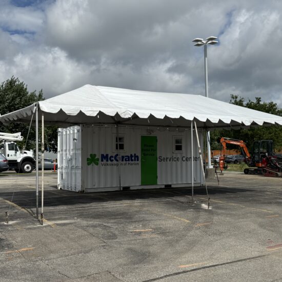 15' x 30' frame tent on leg extensions at Caliber Collision in Marion, Iowa