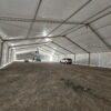 Under the 60' x 230' (18m x 70m) Losberger temporary clearspan structure (tent) for rent