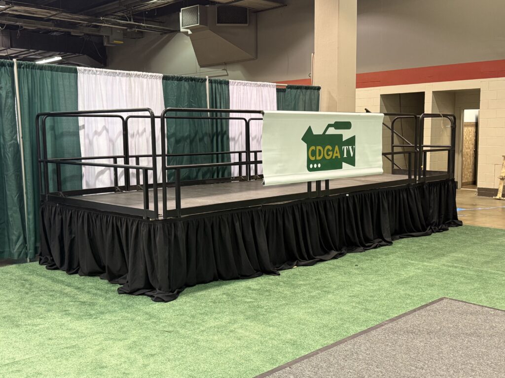 8' x 20' x 32" Press Riser at the Chicago Golf Show® in Rosemont, Illinois at Donald E. Stephens Convention Center