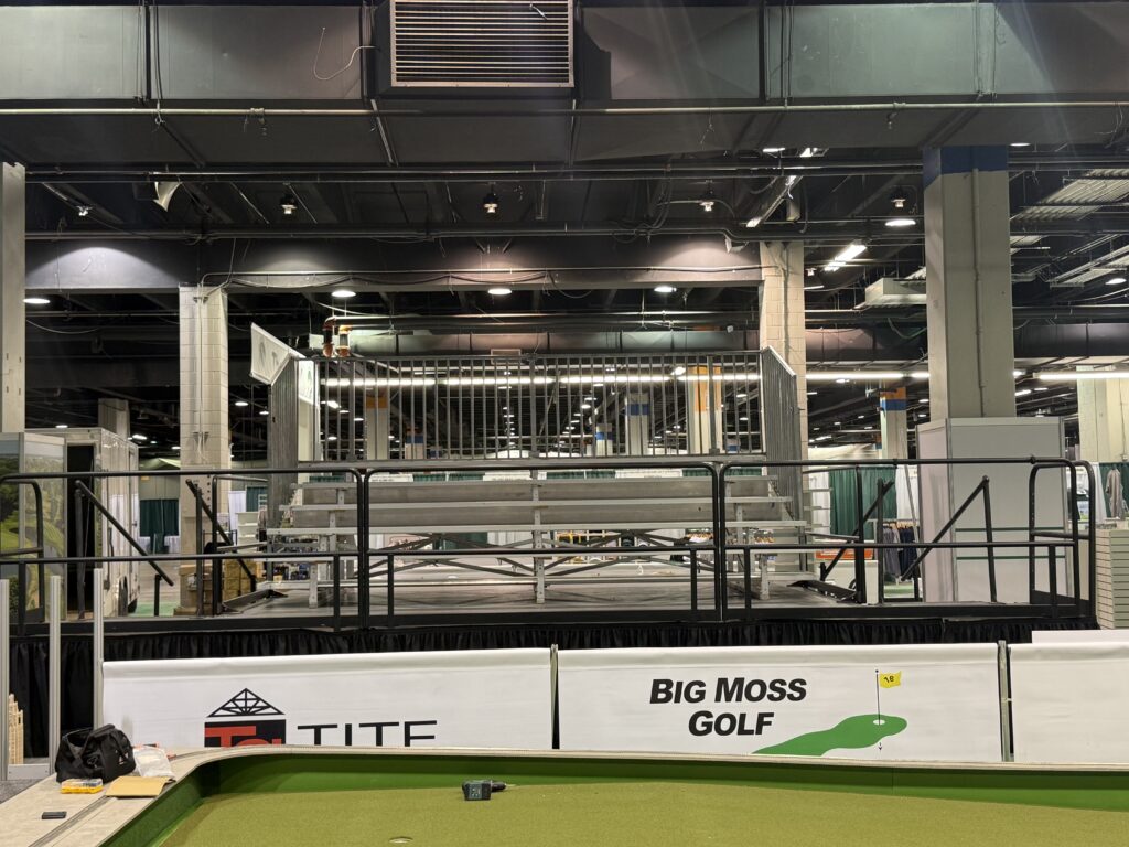 Front of Elevated Bleacher (5-Row breakdown bleacher that seats 50 people on a 16' x 16' x 34" stage) at the Chicago Golf Show® at Donald E. Stephens Convention Center in Rosemont, Illinois
