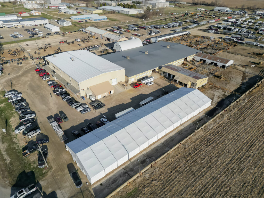 Aerial (drone) view of 60′ x 230′ (18m x 70m) Losberger clearspan event structure Waverly Sales Co., in Waverly, Iowa