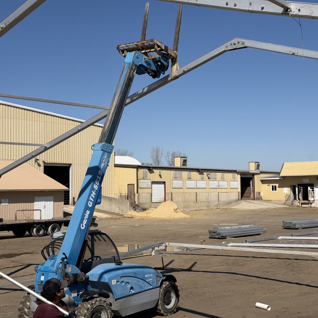 Genie Telehandler is used on the construction of the 60′ x 230′ (18m x 70m) Losberger clearspan event structure