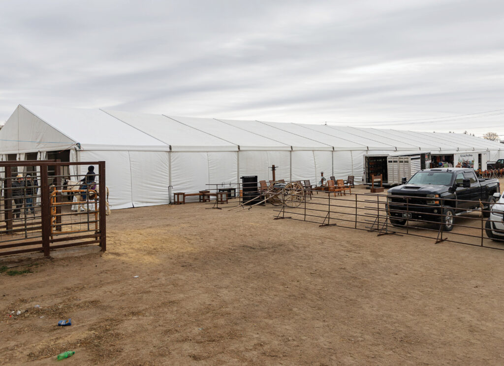 Outside of 60′ x 230′ (18m x 70m) clearspan event structure at Waverly Sales Co in 2026.