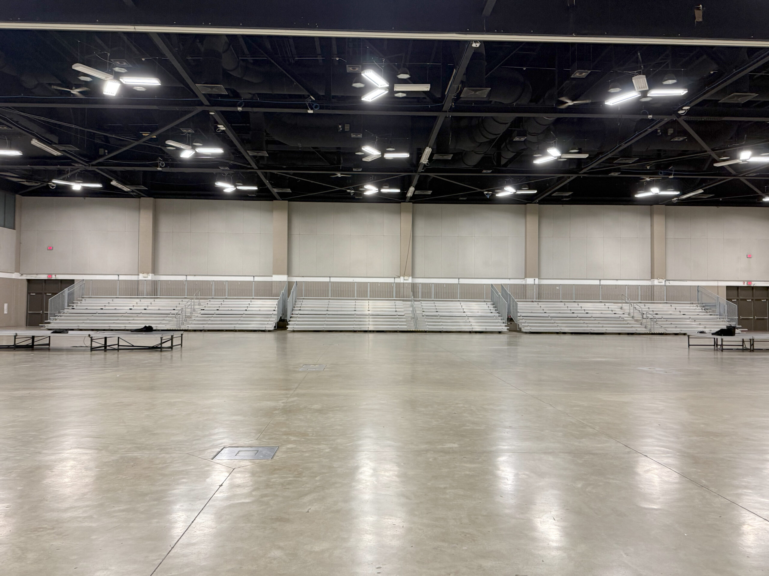 Front view of three towable bleachers for the 2026 USA Gymnastics event at RiverCenter in Davenport, Iowa