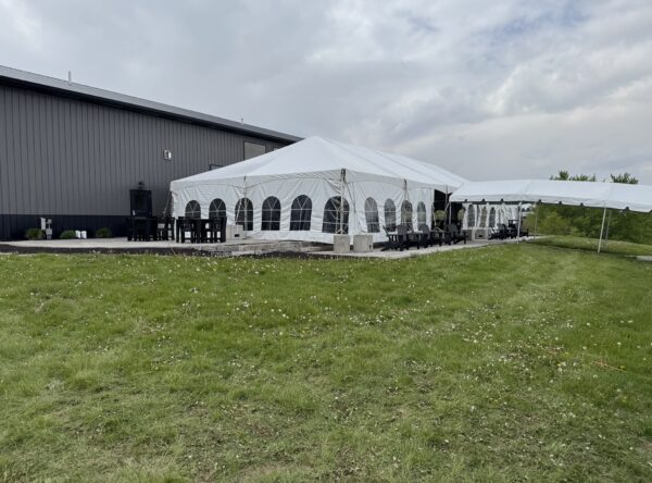 30′ x 75′ Frame Tent on the left with 10′ x 30′ Frame Tent off of it. 30′ x 75′ Frame Tent on the left with 10′ x 30′ Frame Tent off of it.