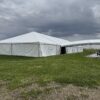 40′ x 120′ Hybrid Tent on the left with 10′ x 30′ Frame Tent walkway into 30′ x 75′ Frame Tent on the far right.