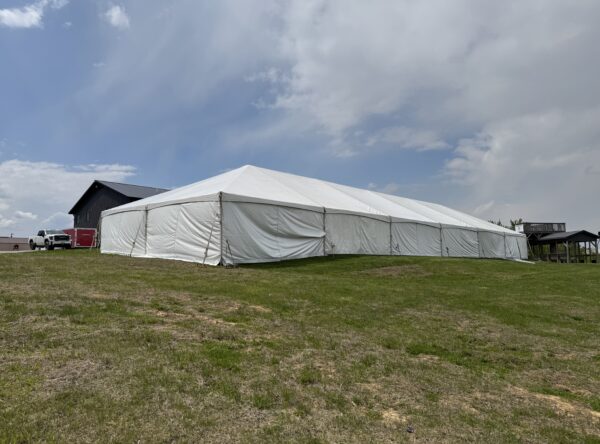Corner of 40′ x 120′ Hybrid Tent with solid sidewalls. Corner of 40′ x 120′ Hybrid Tent with solid sidewalls.