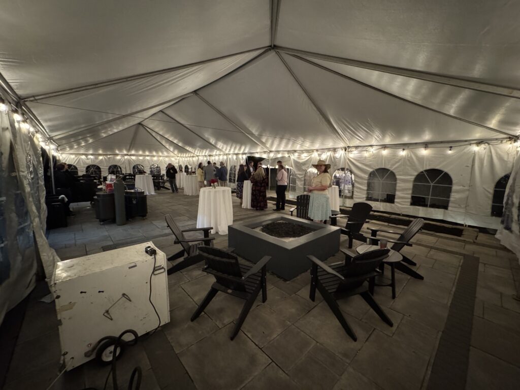Heat under the 30′ x 75′ frame tent with French windows and lights.