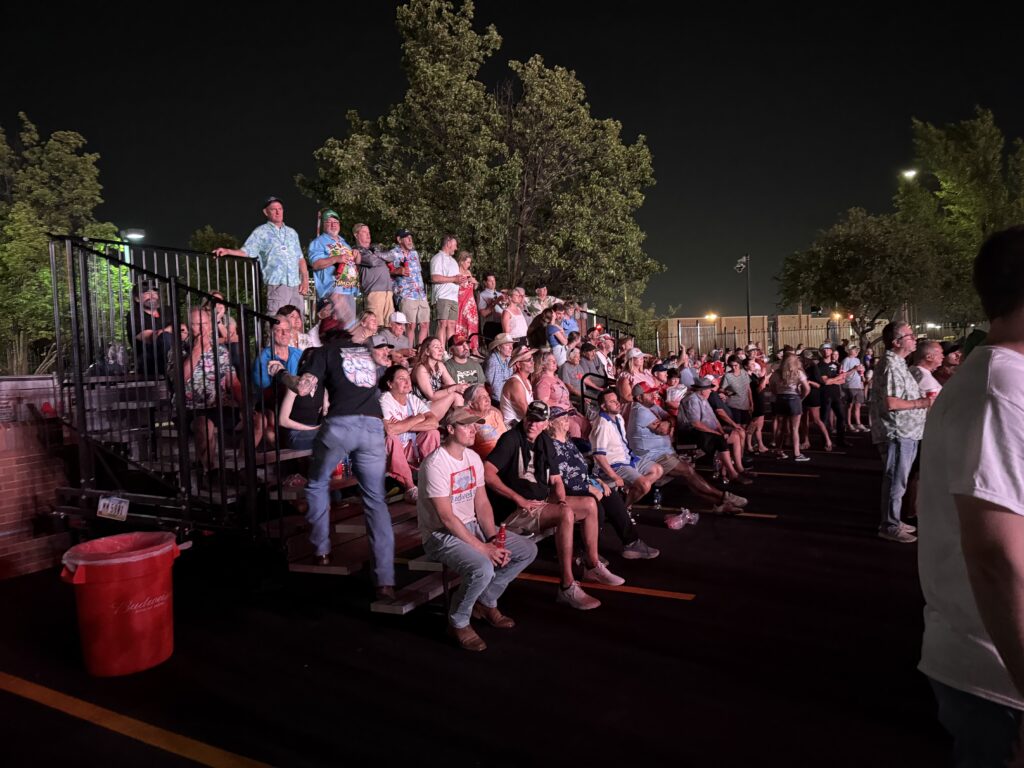 People watching the concert 7-row towable bleachers for Budweiser’s 150th Anniversary Celebration in St. Louis, Missouri