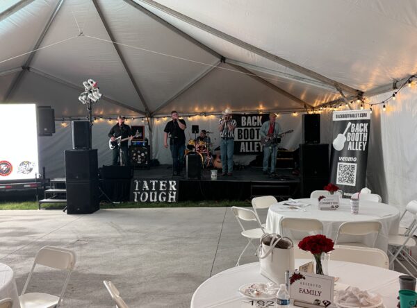 Stage under event tent. Stage under event tent.