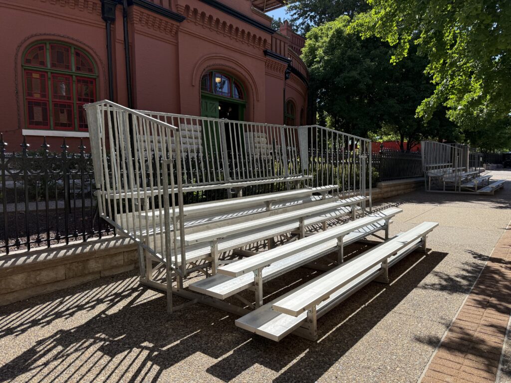 Two of our 5-Row Bleachers with railing outside of the Budweiser building for the 150th Anniversary Celebration in St. Louis, Missouri