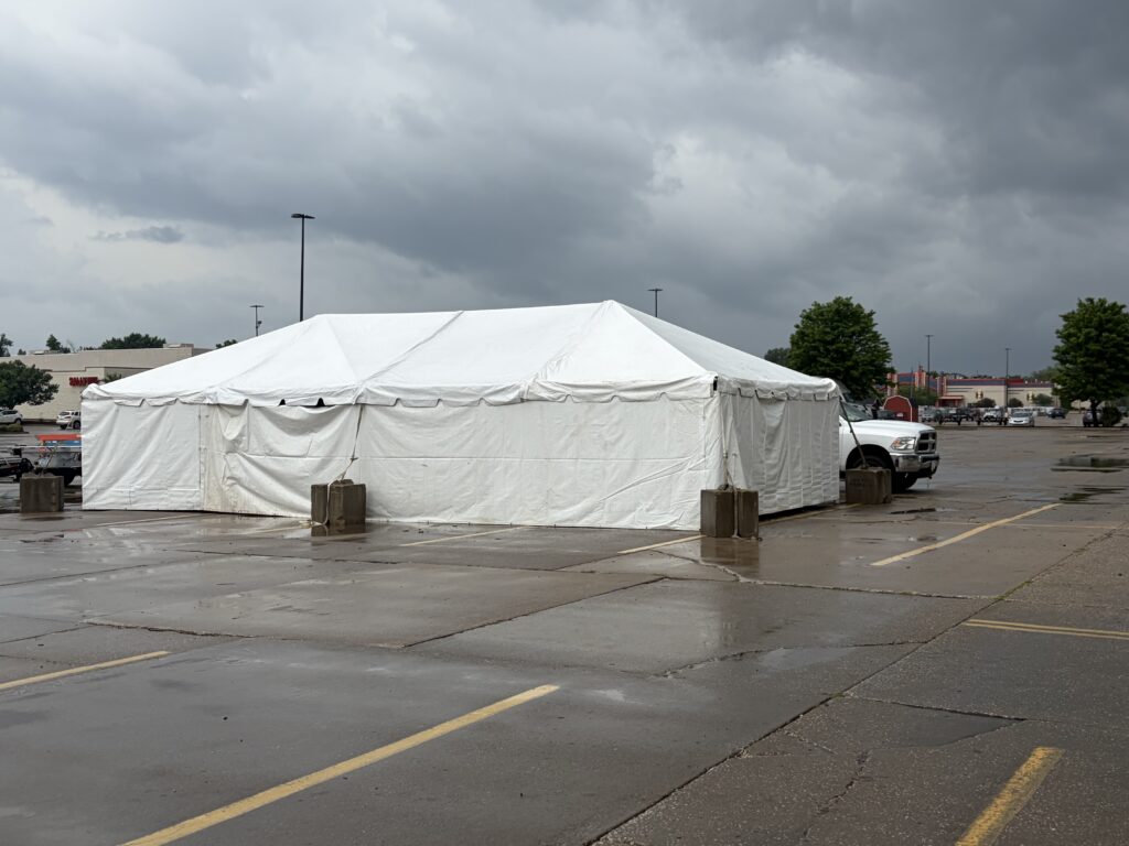 20' x 40' Frame Tent with tables for TNT Fireworks at a Walmart parking lot in Moline, Illinois
