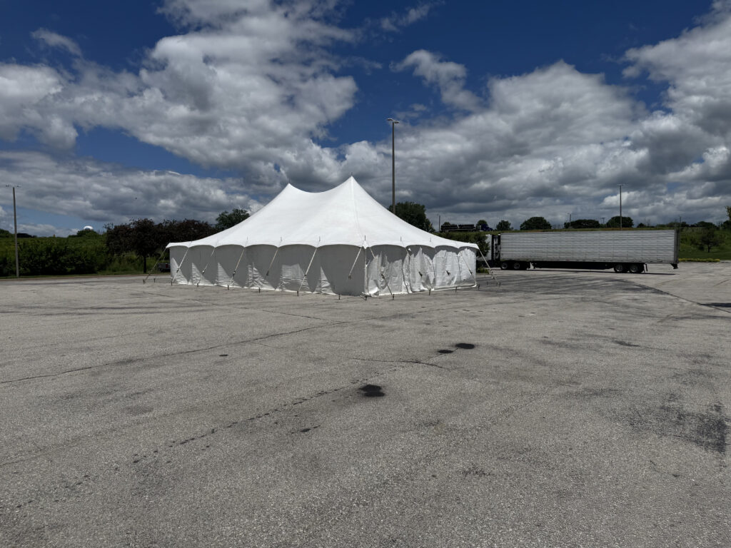 30' x 40' Rope & Pole Tent Setup on Asphalt at Coral Ridge Mall for TNT Fireworks (full)