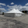 30' x 40' Rope & Pole Tent Setup on Asphalt at Coral Ridge Mall for TNT Fireworks (mall sign)