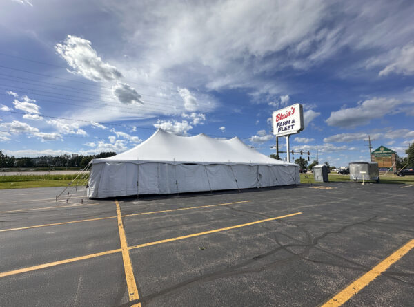 30' x 60' Rope and Pole Tent in Sterling, Illinois for Cornellier Fireworks with Blair's Farm & Fleet sign (edit) 30' x 60' Rope and Pole Tent in Sterling, Illinois for Cornellier Fireworks with Blair's Farm & Fleet sign (edit)