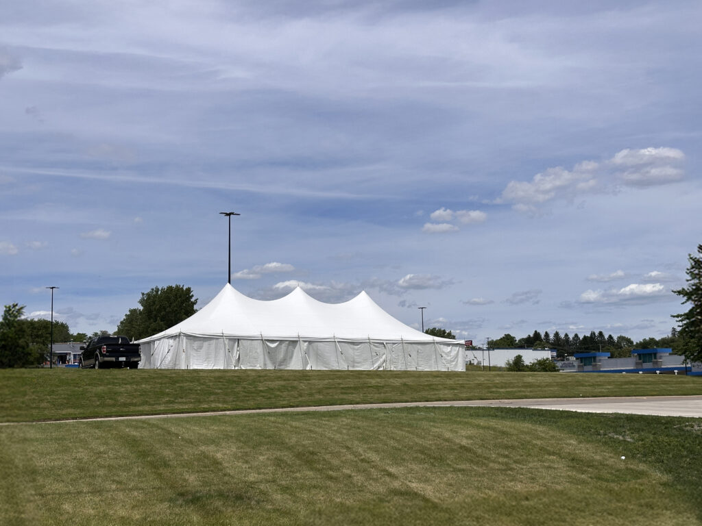 30' x 60' Rope and Pole tent (staked) with tables, and sidewalls in Freeport, Illinois for Cornelier Fireworks