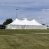 30' x 60' Rope and Pole tent (staked) with tables, and sidewalls in Freeport, Illinois for Cornelier Fireworks.