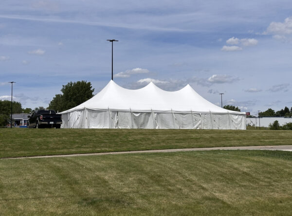 30' x 60' Rope and Pole tent (staked) with tables, and sidewalls in Freeport, Illinois for Cornelier Fireworks. 30' x 60' Rope and Pole tent (staked) with tables, and sidewalls in Freeport, Illinois for Cornelier Fireworks.