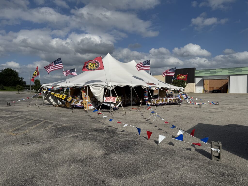 30′ x 40′ Rope & Pole Tent Setup on Asphalt at Coral Ridge Mall for TNT Fireworks (open for business)