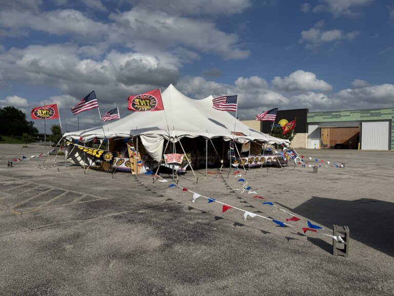 30′ x 40′ Rope & Pole Tent Setup on Asphalt at Coral Ridge Mall for TNT Fireworks (open for business)