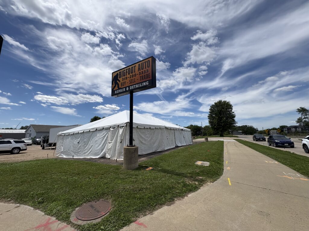 Bigfoot Auto sign and the 30' x 45' Frame Tent and tables in Hiawatha, Iowa for Cornelier Fireworks