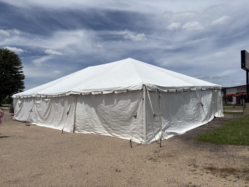 Corner of the 30' x 45' Frame Tent and tables in Hiawatha, Iowa for Cornelier Fireworks