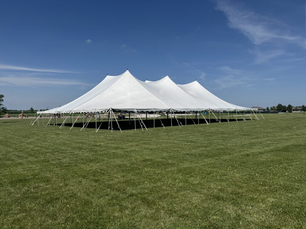 Corner of the 80′ x 120′ Rope and Pole Tent (9,600 ft²) at North Liberty Blues & BBQ at Centennial Park