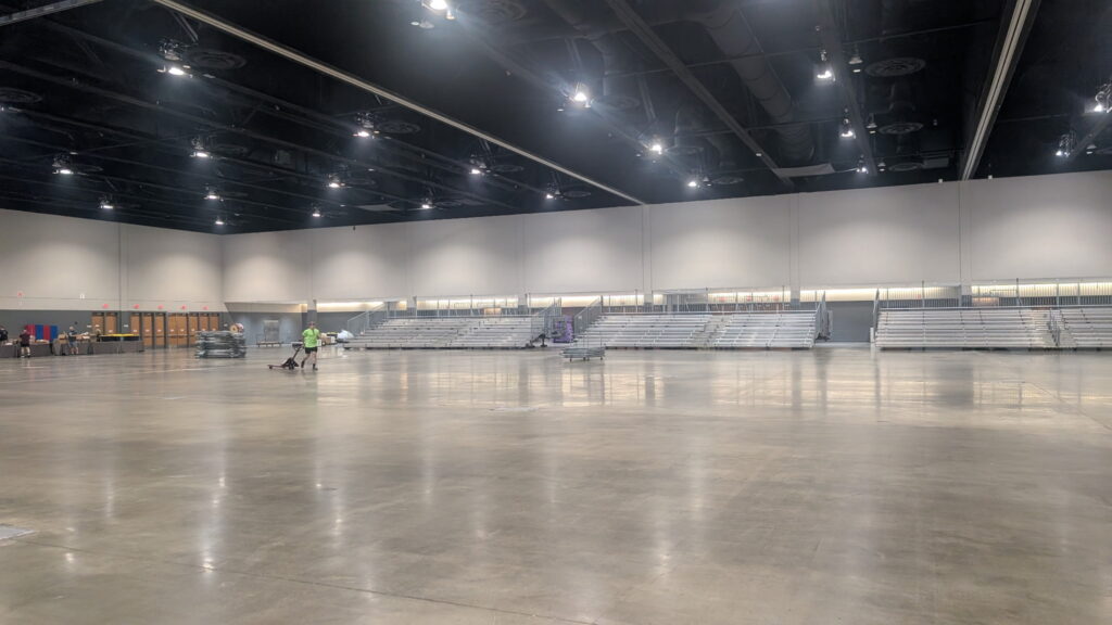 Row of three Big Ten Rentals towable bleacher trailers set-up in the convention center in Schaumburg, IL