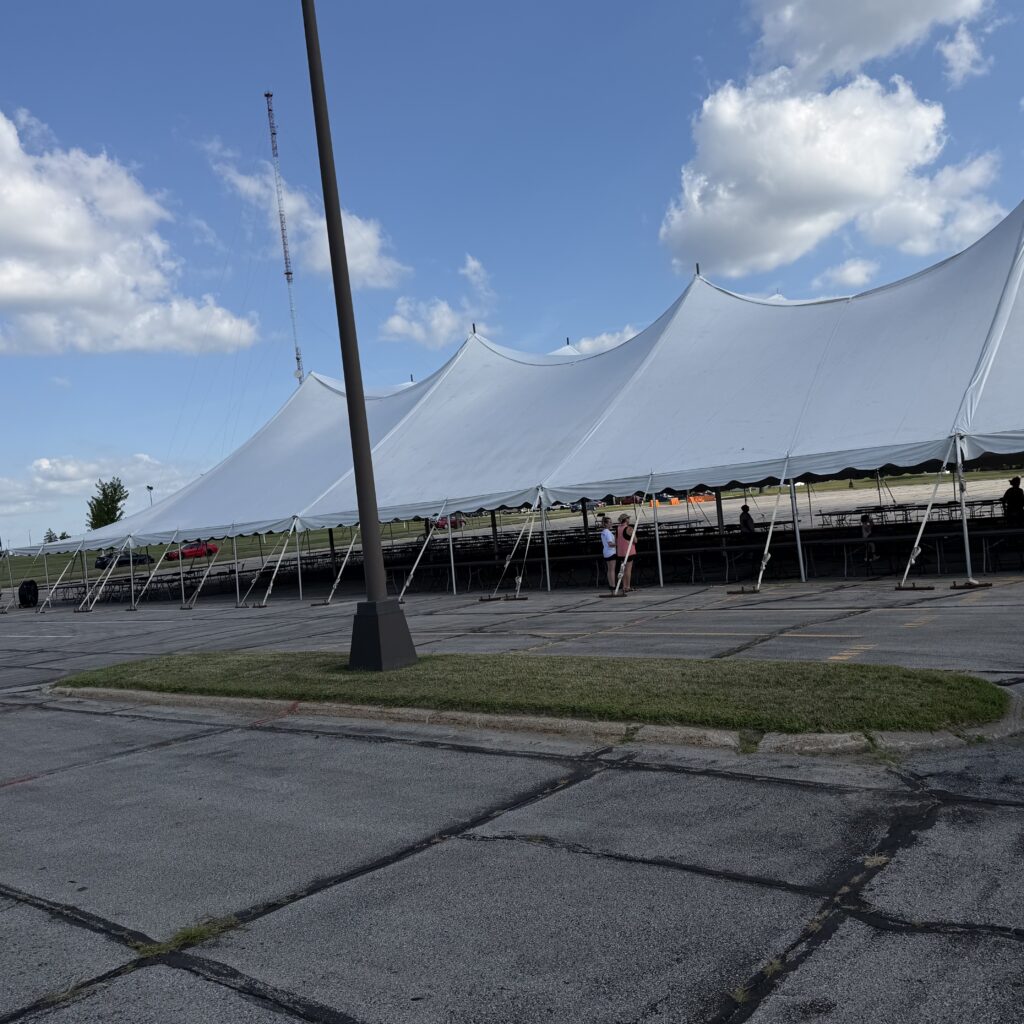 Side of the 80' x 150' twin pole rope and pole tent in Cedar Rapids, Iowa