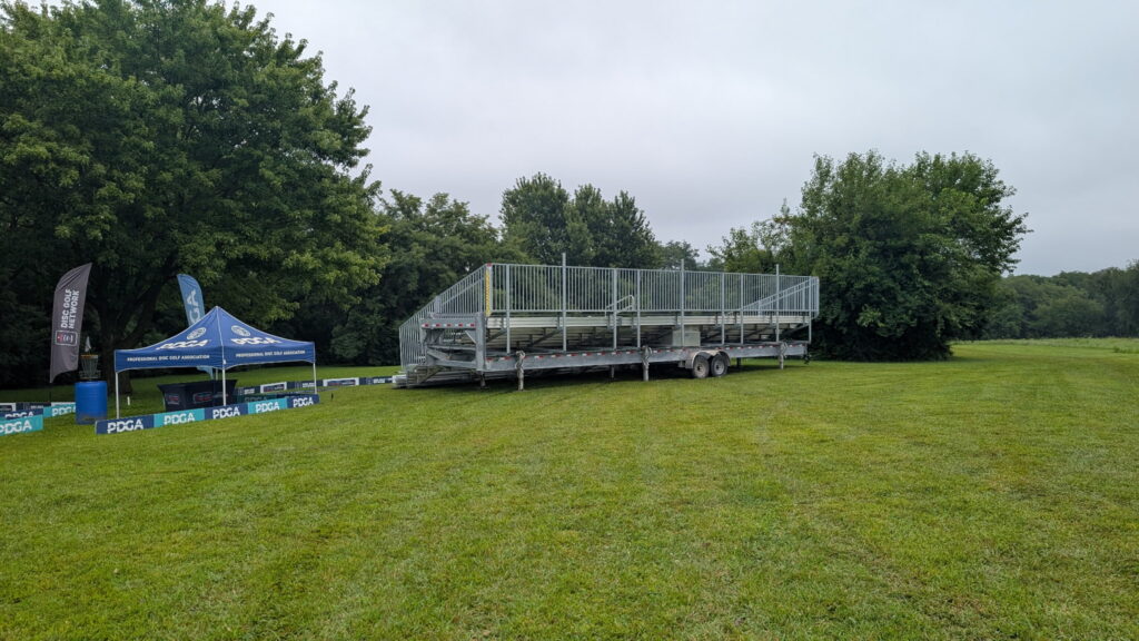 45-foot, 10-row towable bleacher at the 2026 DGPT Discmania Challenge at Pickard Park in Indianola, Iowa
