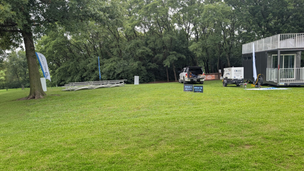 Small bleachers at Hole 1 for the 2026 Disc Golf Pro Tour (DGPT) Discmania Challenge at Pickard Park in Indianola, Iowa