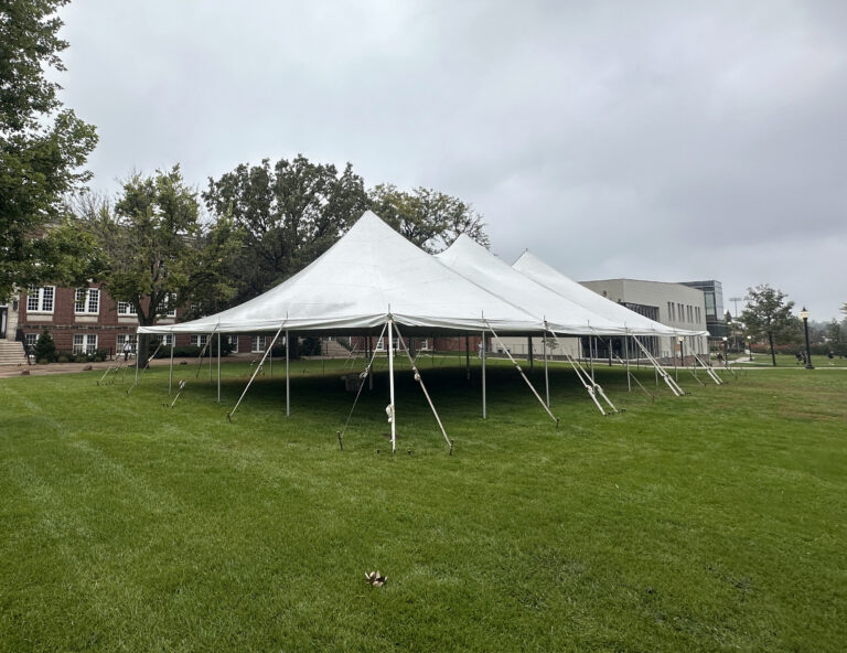 40 by 80 Fred’s rope and pole tent on the Coe College lawn in Cedar Rapids, Iowa, for Homecoming 2026 (close-up)