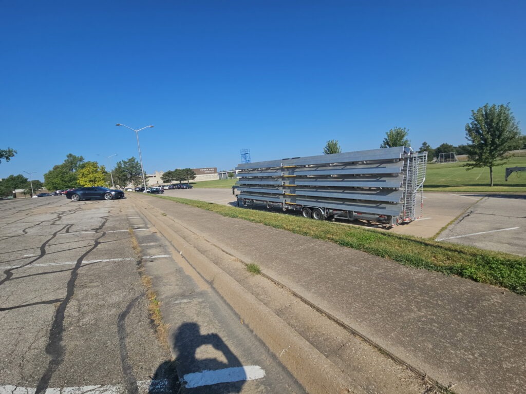 5-row 45-foot towable grandstand delivered by Big Ten Rentals to Emporia State University campus ahead of Hornets football at Welch Stadium.
