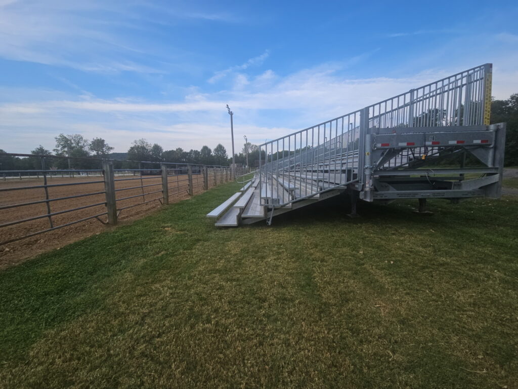 Big Ten Rentals 45-foot 10-row towable bleacher unit 16 unfolded at the Iron Horse Rodeo in Pacific, MO