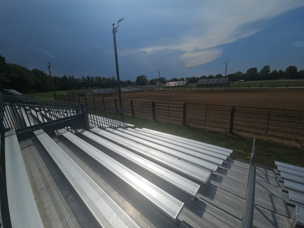 Liberty Field arena seating setup in Pacific, MO for the 2026 Iron Horse Rodeo